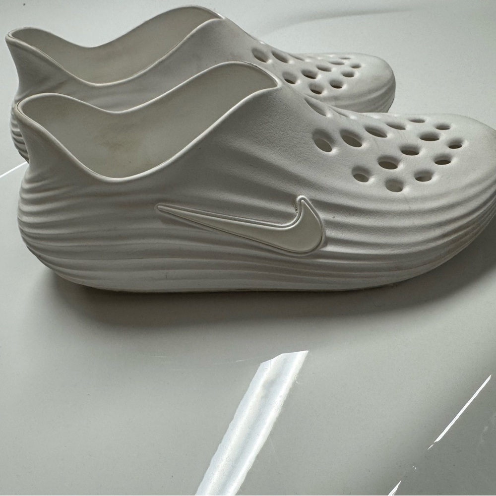 Nike White Perforated Slip-Ons